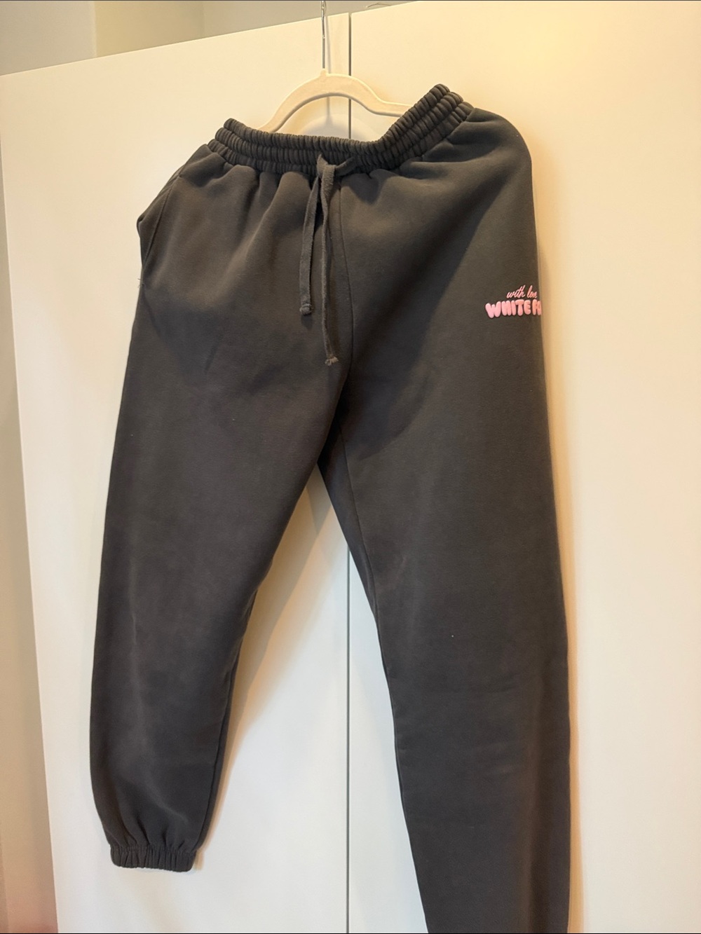 White Fox Boutique Black Joggers with Pink Logo